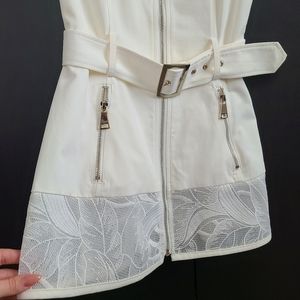 BEBE creamy peplum lace v-neck vest with belt